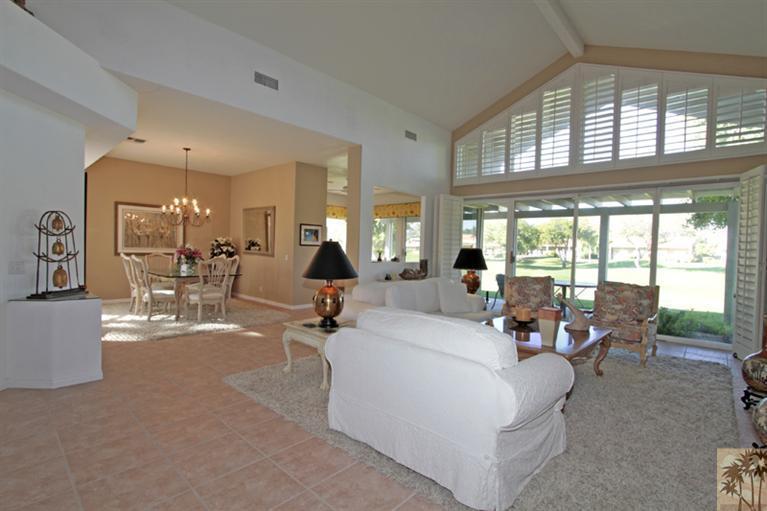 41 Augusta Drive Rancho Mirage, CA 92270 - Photo 4 of 25 a living room with furniture and a large window