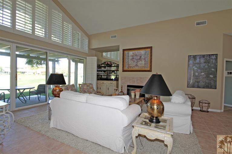 41 Augusta Drive Rancho Mirage, CA 92270 - Photo 5 of 25 a living room with furniture and a large window