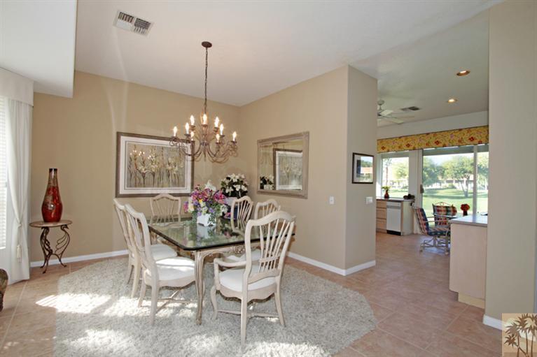 41 Augusta Drive Rancho Mirage, CA 92270 - Photo 9 of 25 a dining room with furniture a chandelier and window