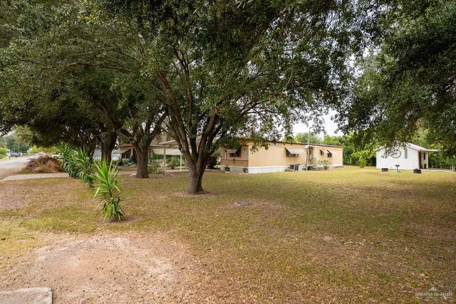 a view of road and trees