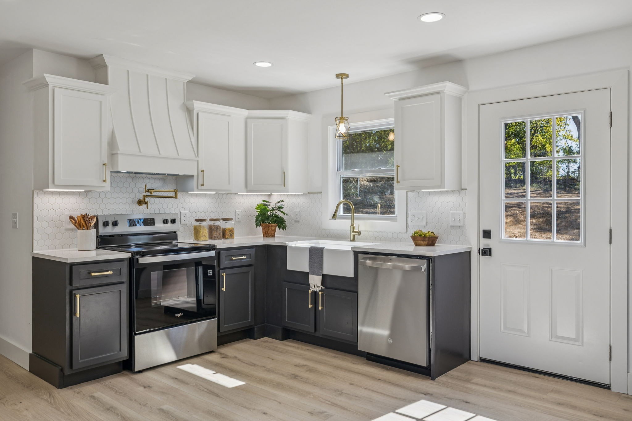 116 Ridgecrest Drive Hendersonville, TN 37075 - Photo 18 of 38 a kitchen with stainless steel appliances granite countertop a stove sink and cabinets