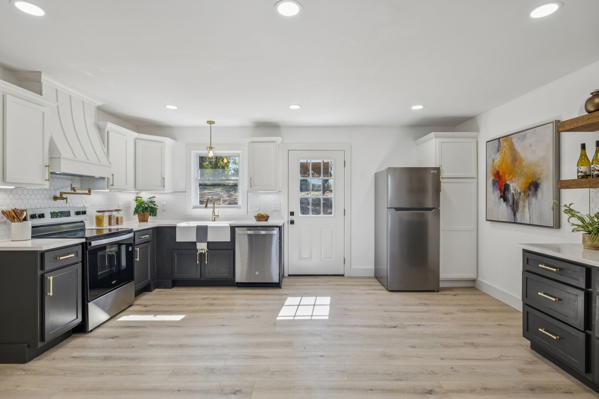 116 Ridgecrest Drive Hendersonville, TN 37075 - Photo 19 of 38 a kitchen with stainless steel appliances granite countertop a refrigerator stove and oven
