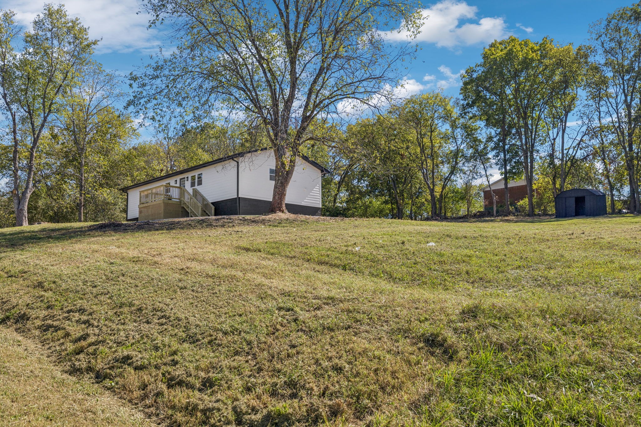 116 Ridgecrest Drive Hendersonville, TN 37075 - Photo 2 of 38 a view of a yard with a house
