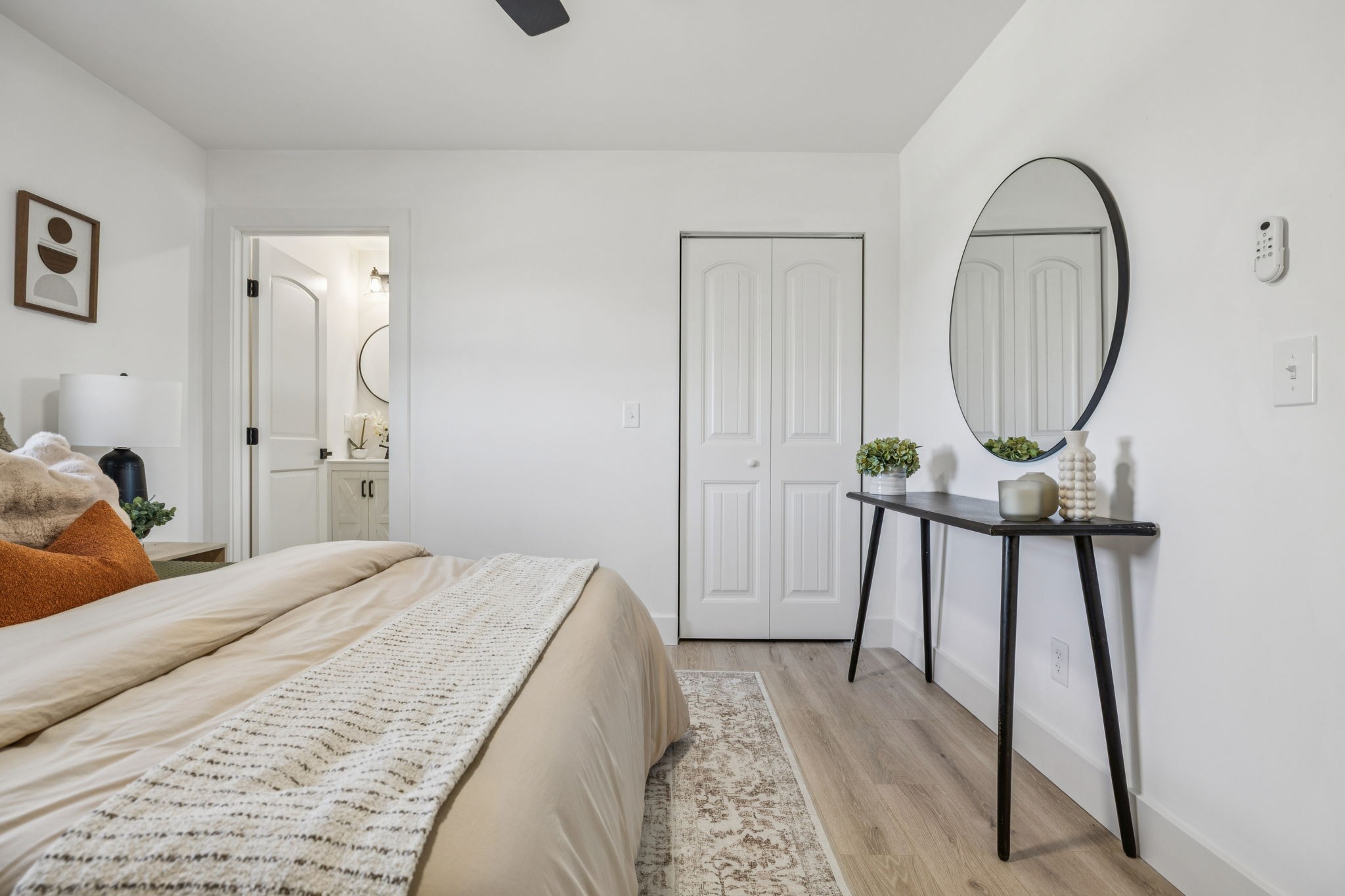 116 Ridgecrest Drive Hendersonville, TN 37075 - Photo 31 of 38 a bedroom with a bed a table and a mirror