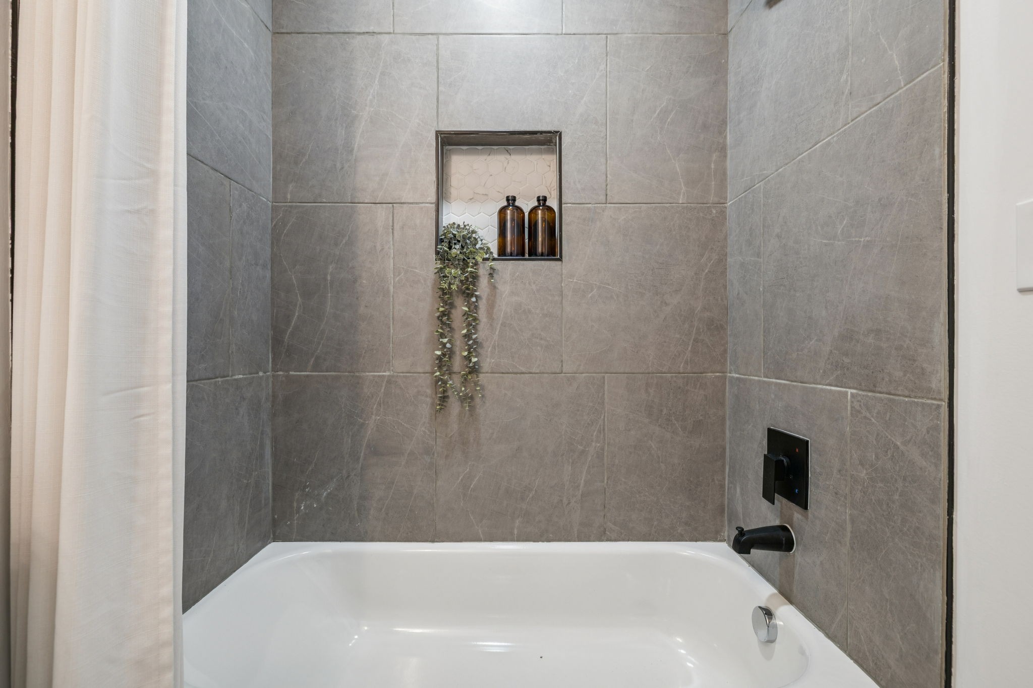 116 Ridgecrest Drive Hendersonville, TN 37075 - Photo 34 of 38 a bathroom with a white bath tub