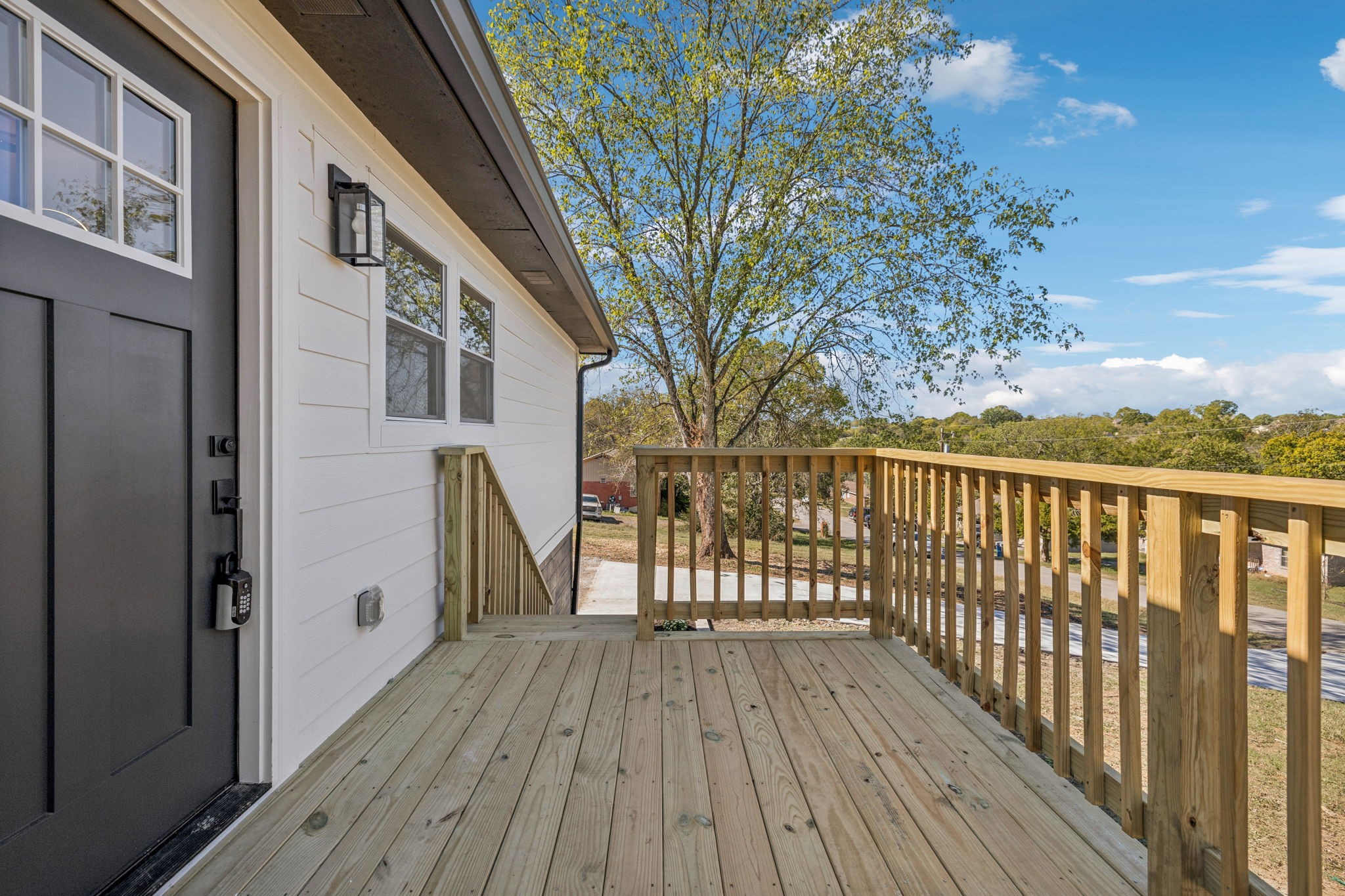116 Ridgecrest Drive Hendersonville, TN 37075 - Photo 7 of 38 a view of wooden balcony with wooden floor and fence