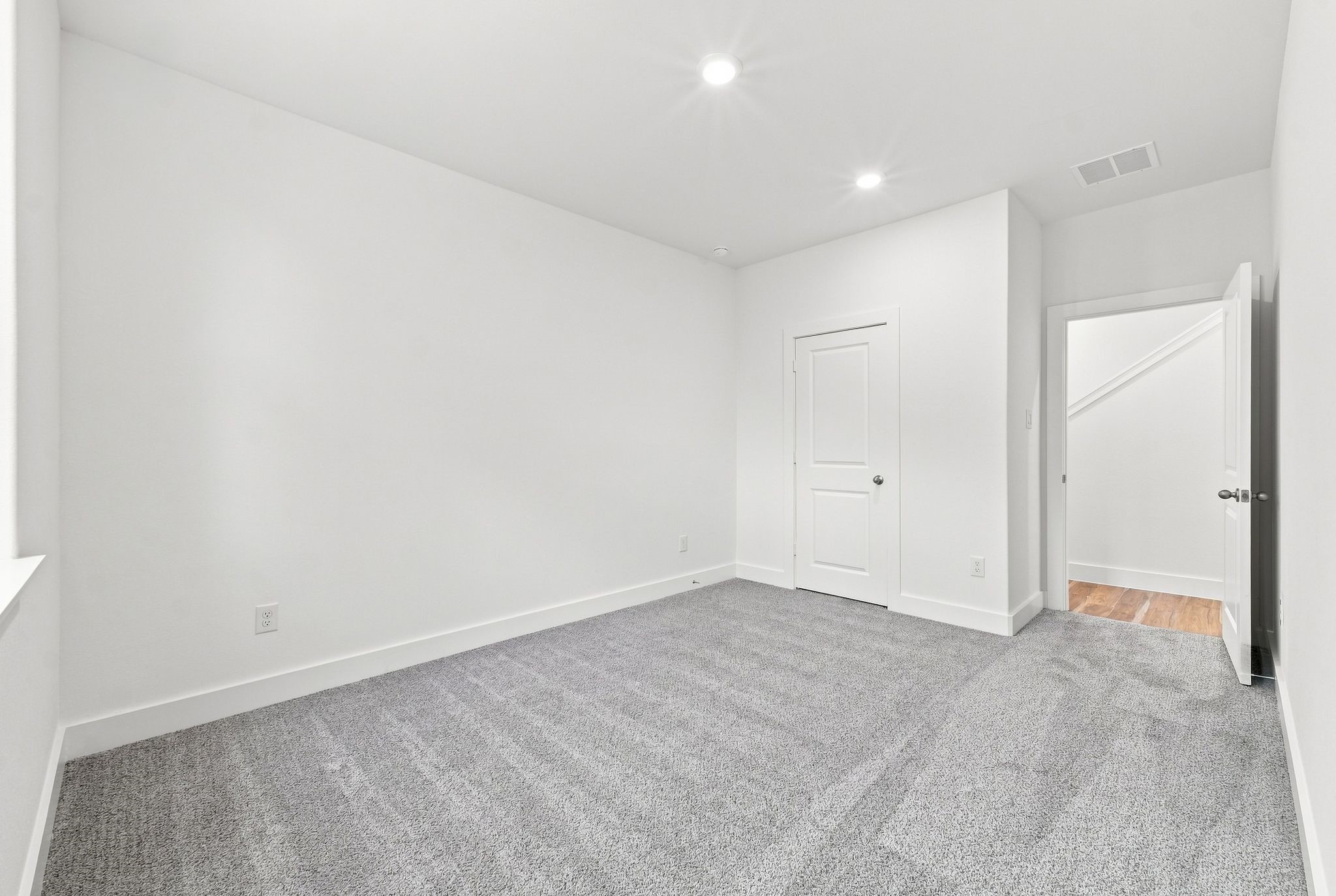 6057 Cebra Street Houston, TX 77091 - Photo 41 of 42 Another view of Bedroom 3 highlighting the room's comfortable dimensions and flexible layout. Photos are from a different property with a similar floor plan. Finishes, features, and orientation may vary.