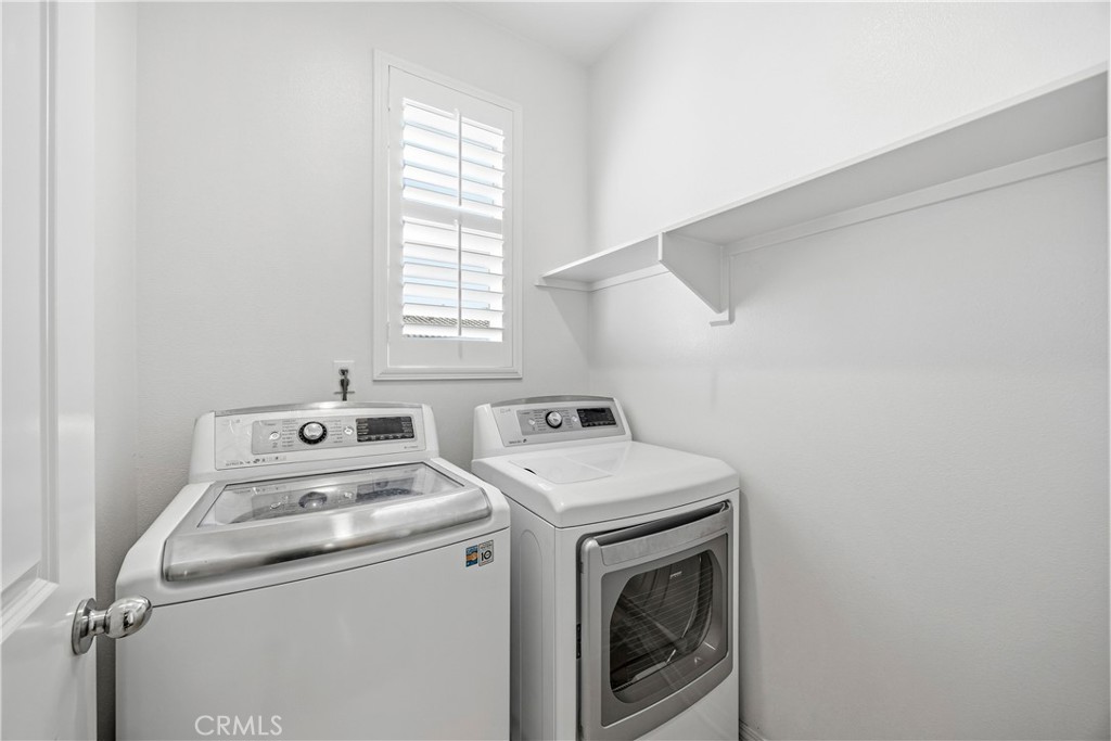 11175 Legion Loop, Unit 110 El Monte, CA 91731 - Photo 20 of 23 a utility room with dryer and washer