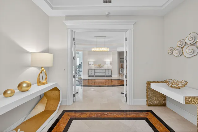 a view of a livingroom with furniture and front door