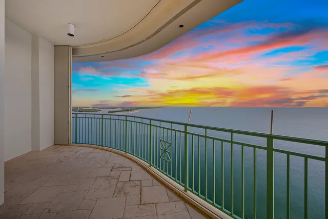 a view of balcony with furniture