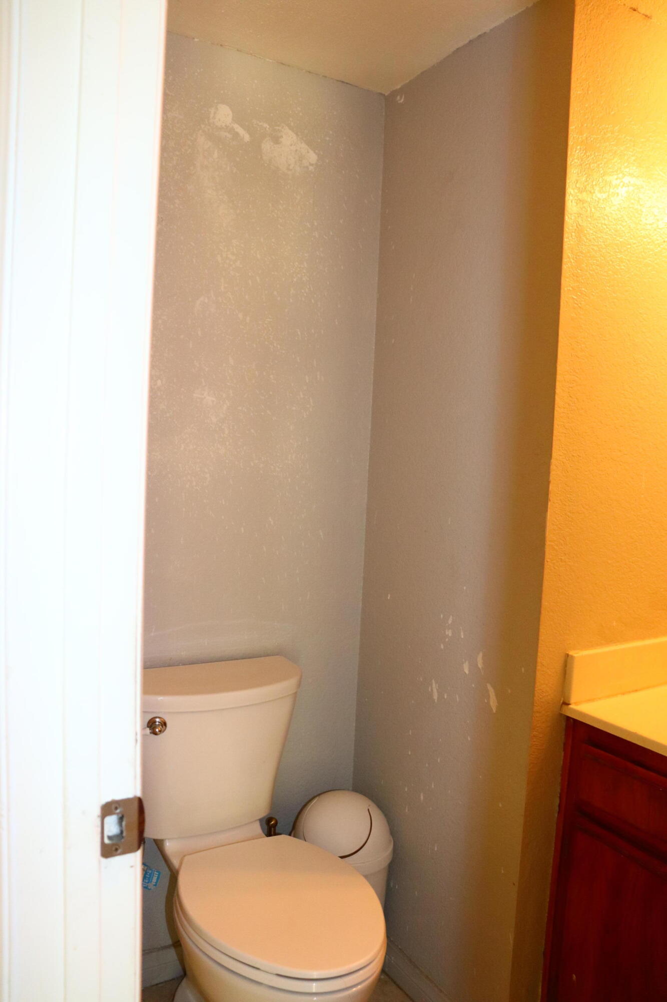 5009 East Ave R 11 Palmdale, CA 93552 - Photo 13 of 23 a white toilet sitting next to a white wall