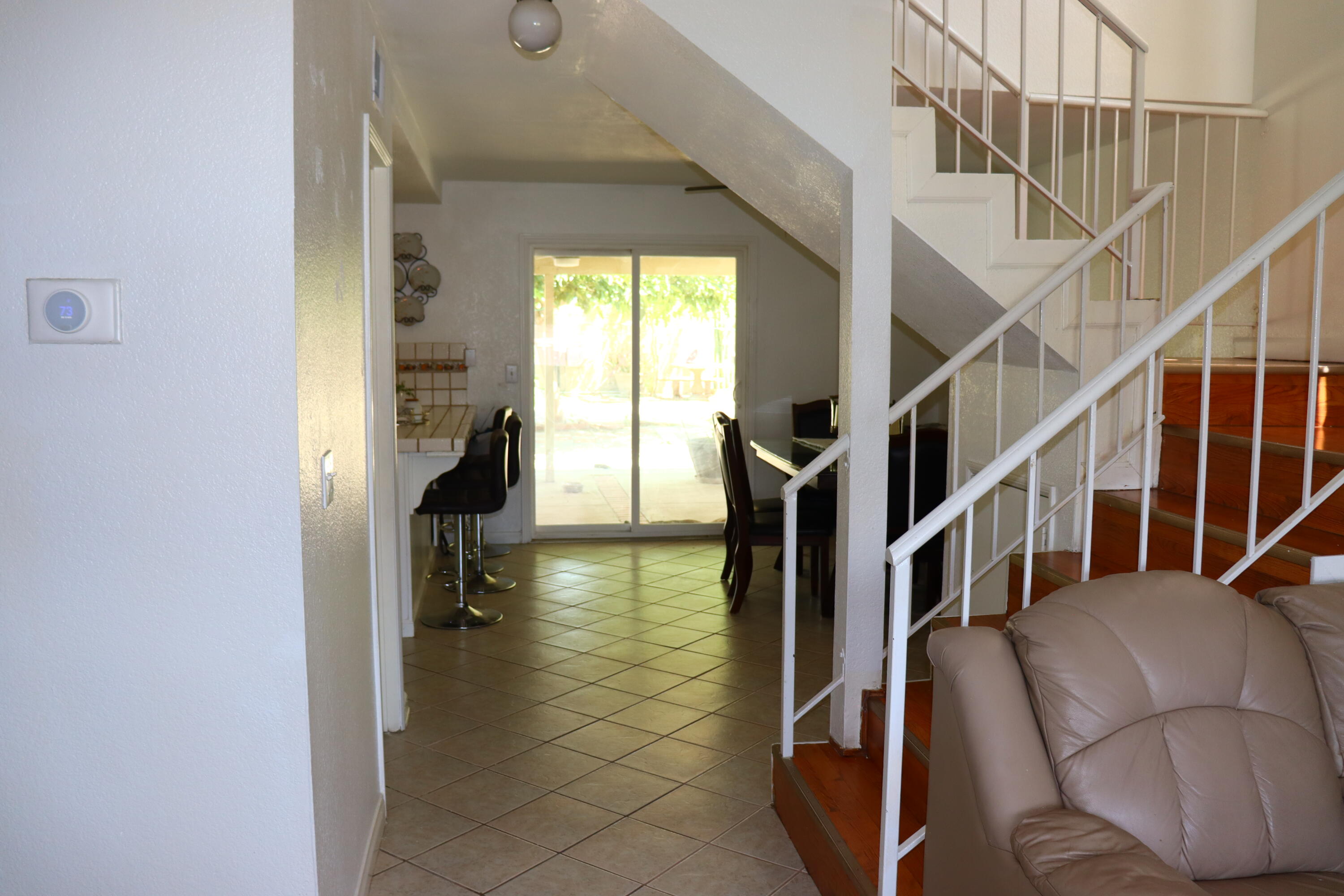 5009 East Ave R 11 Palmdale, CA 93552 - Photo 4 of 23 a view of entryway and hall with wooden floor
