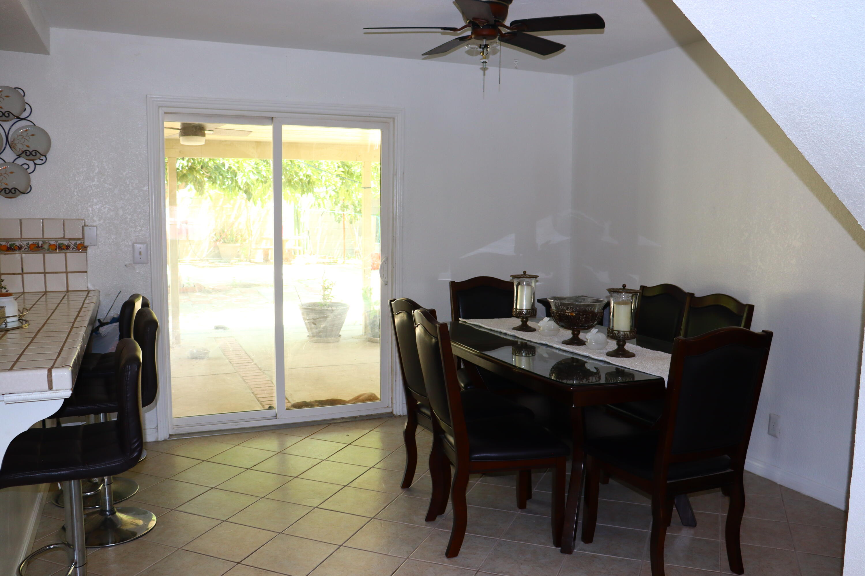 5009 East Ave R 11 Palmdale, CA 93552 - Photo 7 of 23 a view of a workspace with furniture and a window