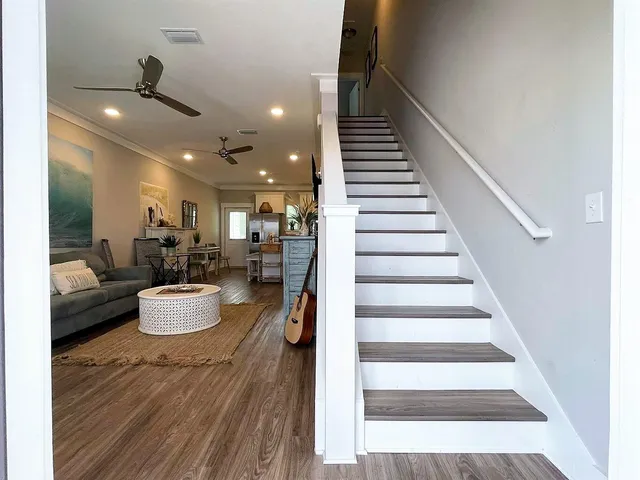 a view of a living room and dining room