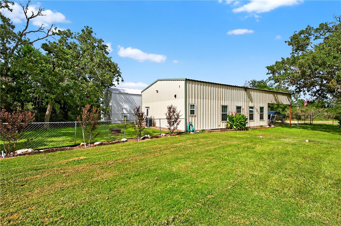 409 Ripple Creek Lane Somerville, TX 77879 - Photo 1 of 33 a view of a house with backyard