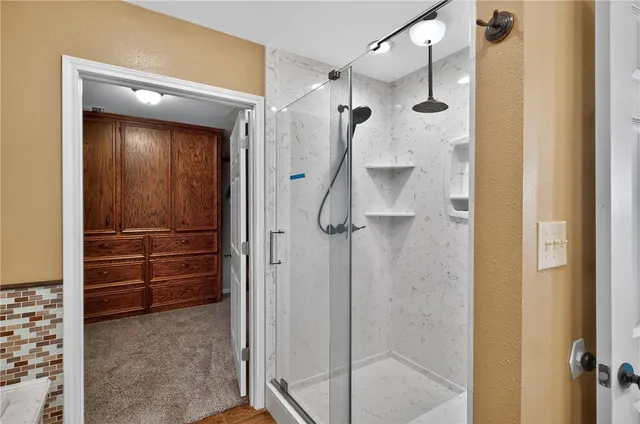 a bathroom with a bathtub and a sink