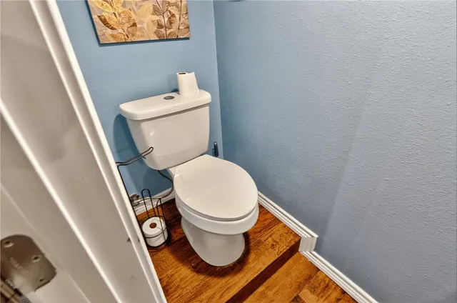 a kitchen with stainless steel appliances granite countertop a stove and refrigerator