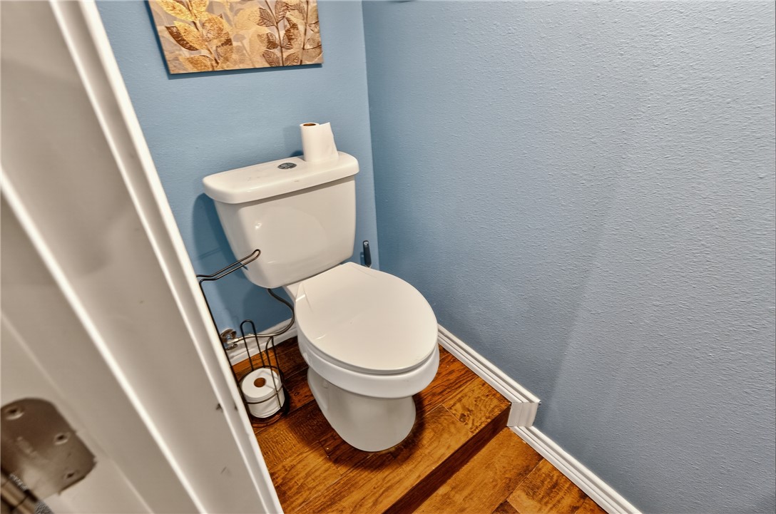 409 Ripple Creek Lane Somerville, TX 77879 - Photo 24 of 33 a white toilet sitting next to a small bathroom