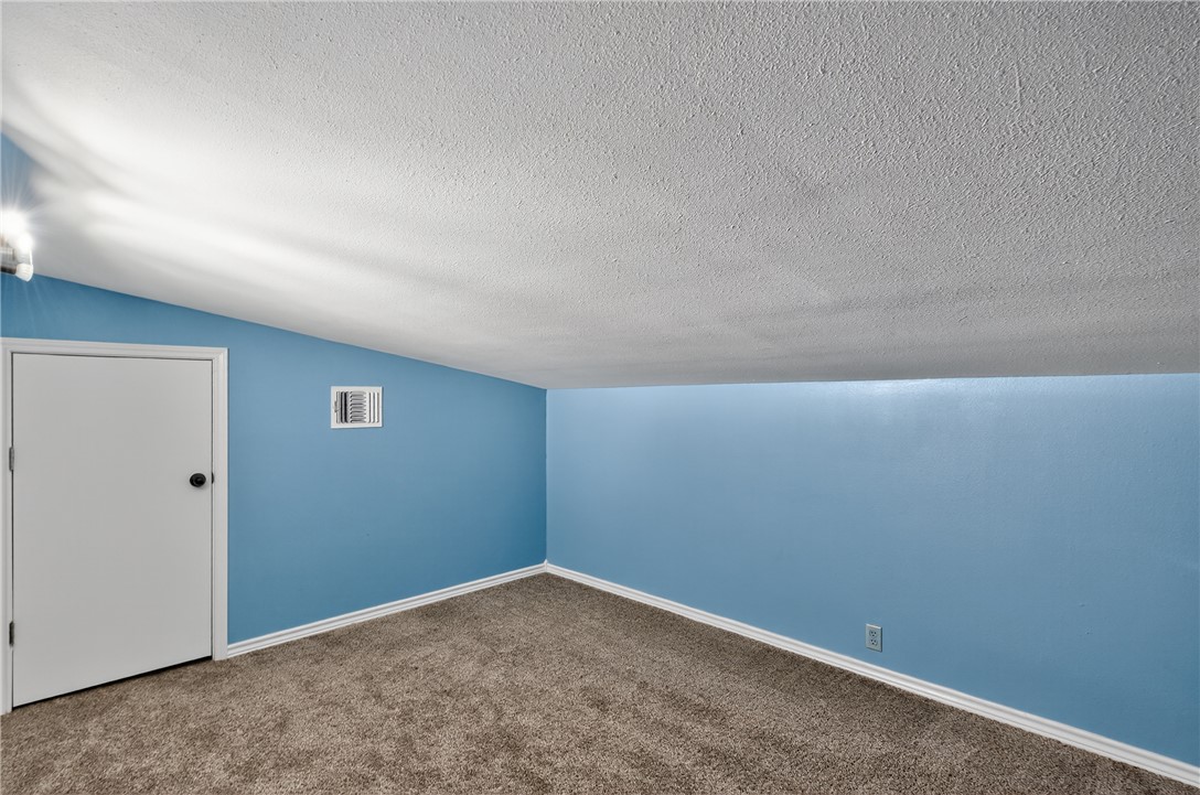 409 Ripple Creek Lane Somerville, TX 77879 - Photo 25 of 33 an empty room with a workbench