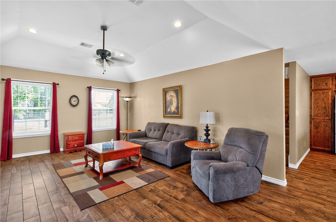 409 Ripple Creek Lane Somerville, TX 77879 - Photo 6 of 33 a living room with furniture and a window