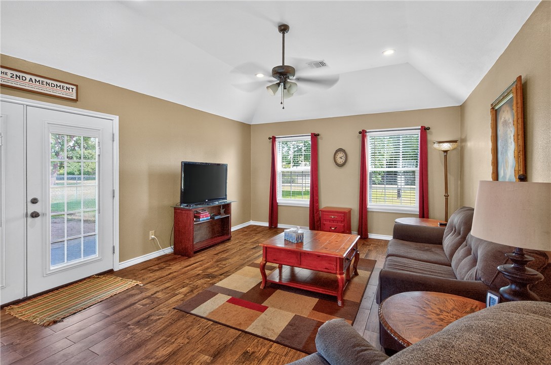 409 Ripple Creek Lane Somerville, TX 77879 - Photo 7 of 33 a living room with furniture and a flat screen tv