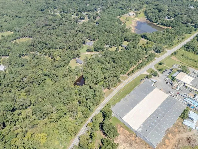 a view of a field with an outdoor space