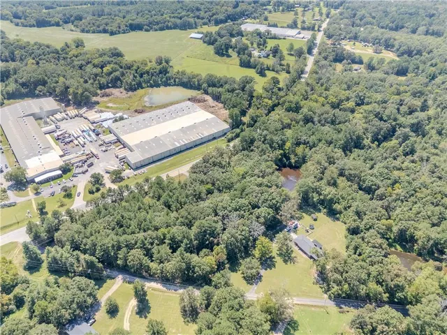 a view of a swimming pool with an outdoor space and seating area