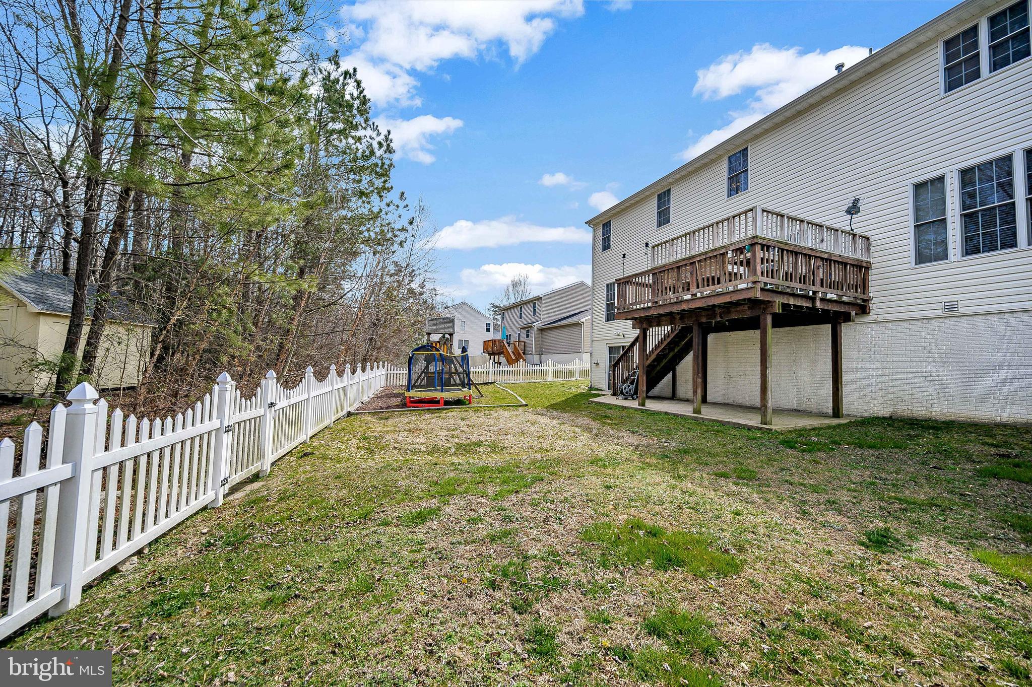 9093 Mullen Road King George, VA 22485 - Photo 32 of 39 Rear View with deck and fenced yard