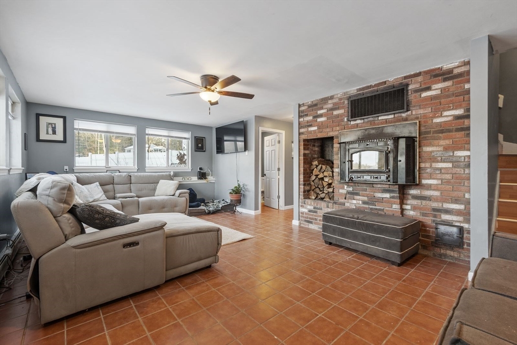 60 Stone Valley Road Orange, MA 01364 - Photo 5 of 27 a living room with furniture