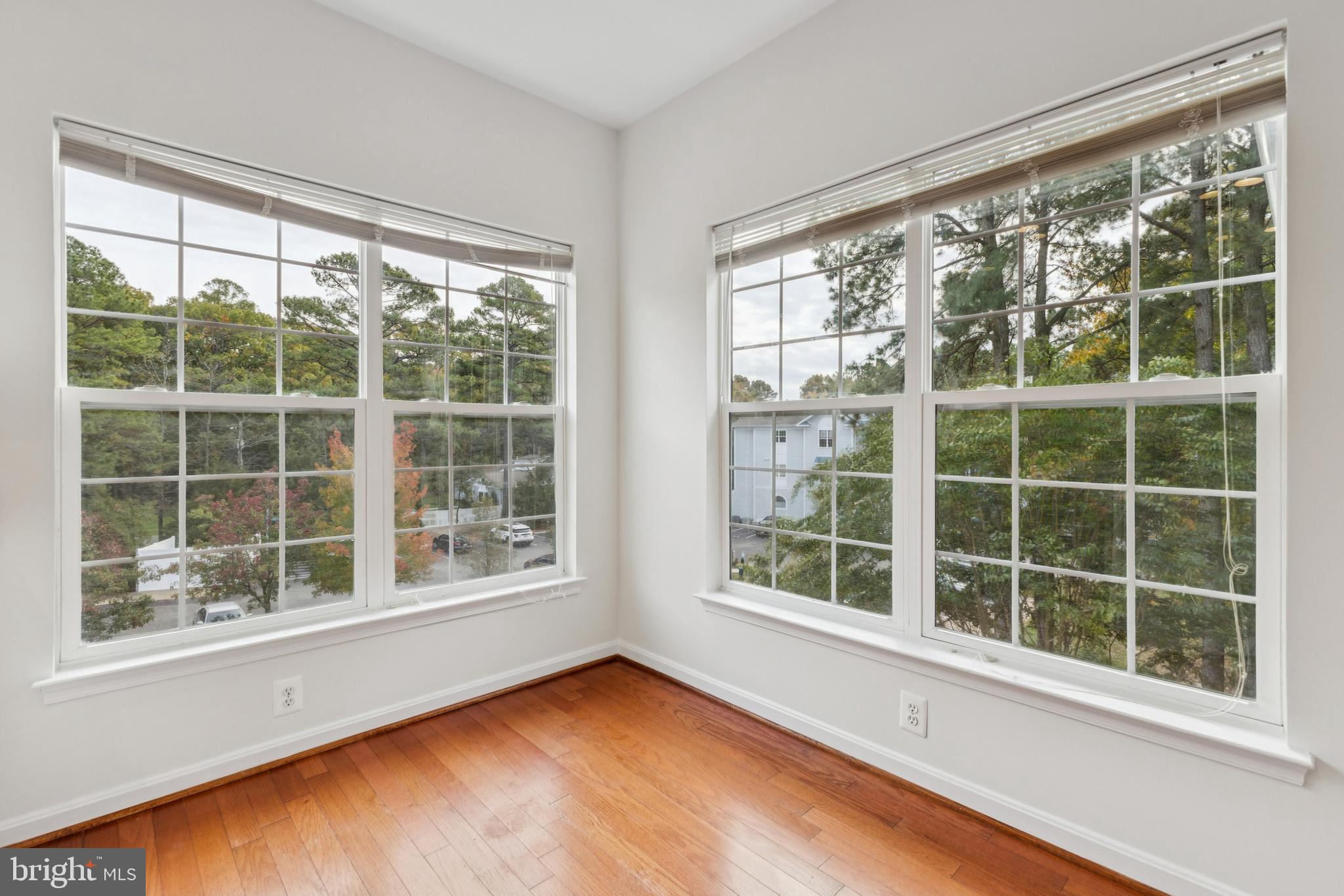 1371 Schooner Loop, Unit 1371 Solomons, MD 20688 - Photo 20 of 38 a view of an empty room with a window