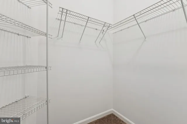 an aerial view of a house with a lake view