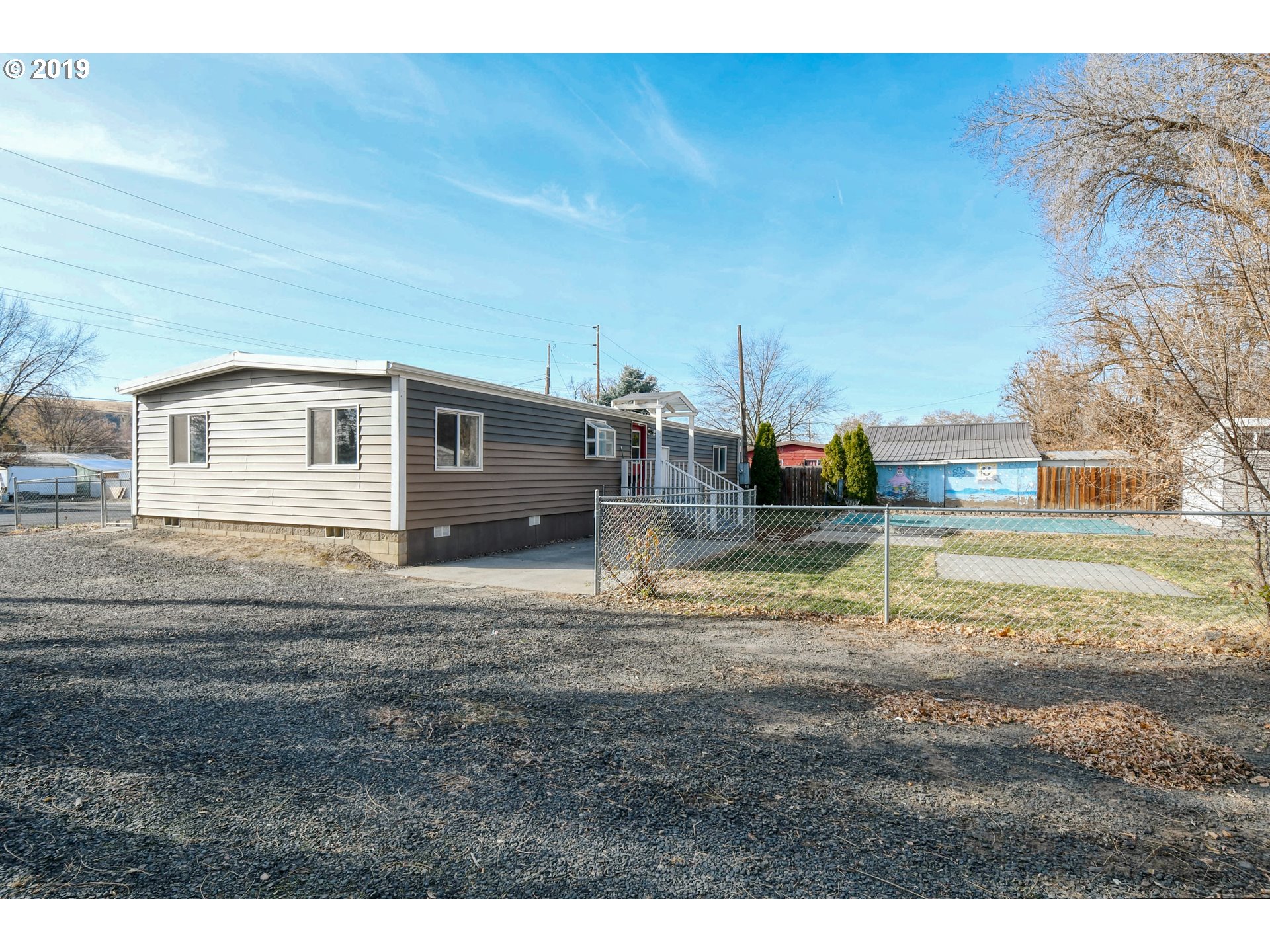 2811 Northeast Riverside Avenue Pendleton, OR 97801 - Photo 29 of 32 a view of a house with a yard