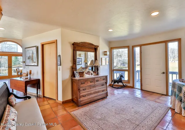 a view of a swimming pool with a table and chairs