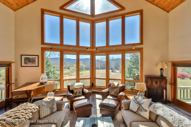 a view of a chairs and table in a patio