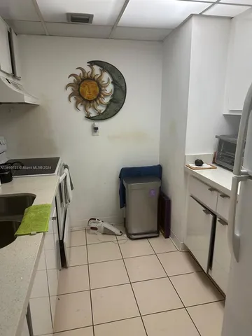 a view of dining room with furniture and entryway