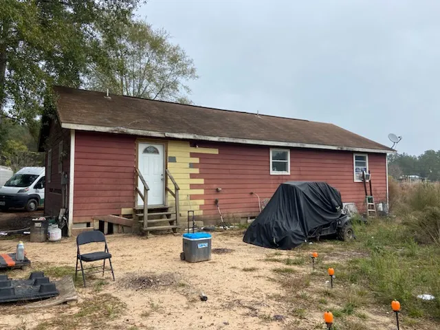 a view of a house with a patio
