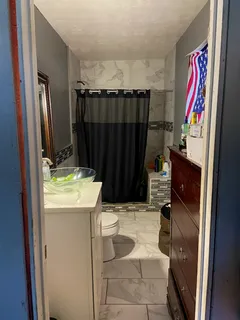 a room with table and chairs