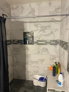 a bed room with a bed and a window