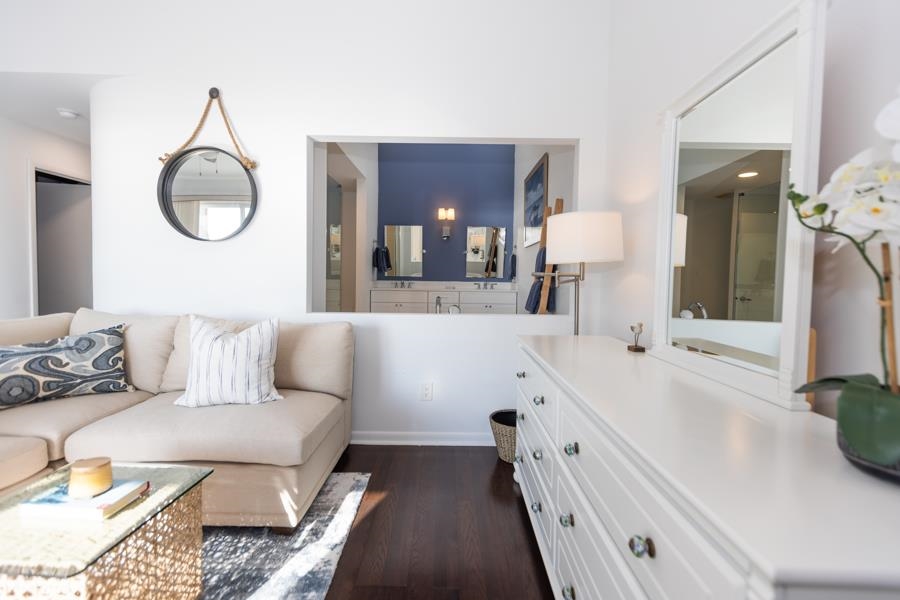 902 Ocean, Unit 906 Cape May, NJ 08204 - Photo 23 of 46 a bathroom with a tub sink and mirror