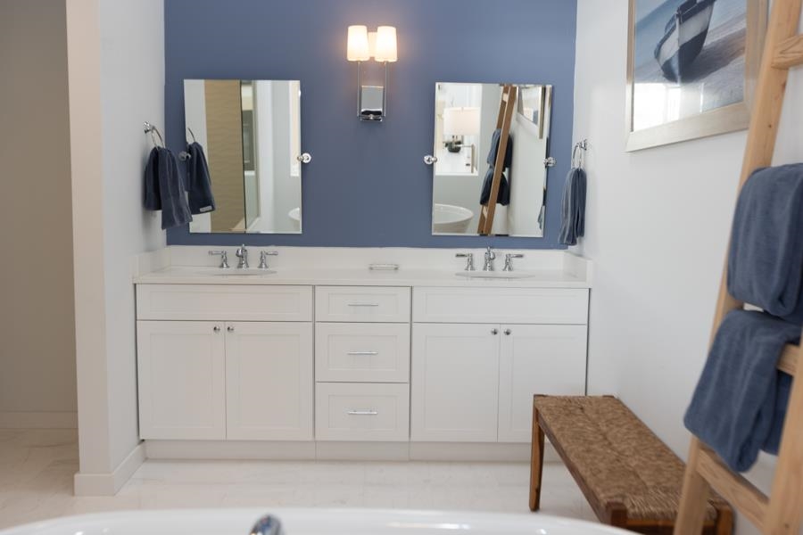 902 Ocean, Unit 906 Cape May, NJ 08204 - Photo 25 of 46 a bathroom with a sink vanity and mirror