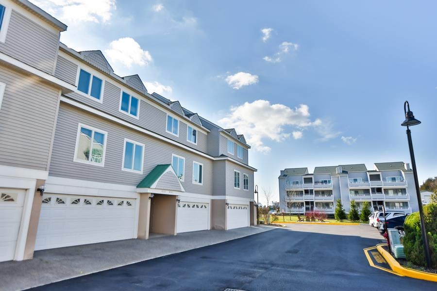 902 Ocean, Unit 906 Cape May, NJ 08204 - Photo 36 of 46 a front view of a building with street view