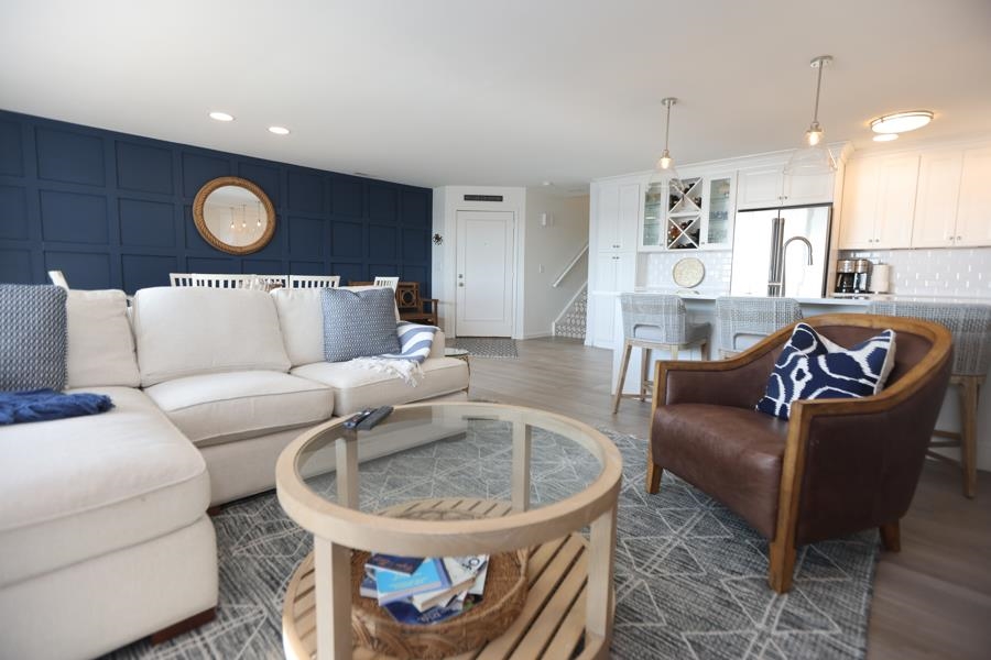 902 Ocean, Unit 906 Cape May, NJ 08204 - Photo 6 of 46 a living room with furniture and a wooden floor