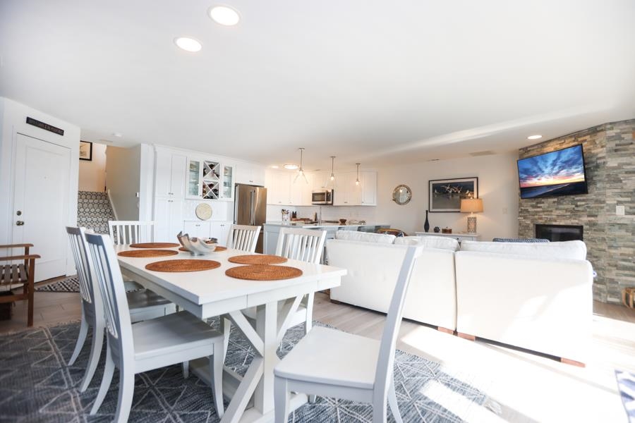 902 Ocean, Unit 906 Cape May, NJ 08204 - Photo 10 of 46 a view of a dining room with furniture
