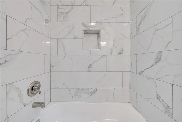 a bathroom with a bathtub