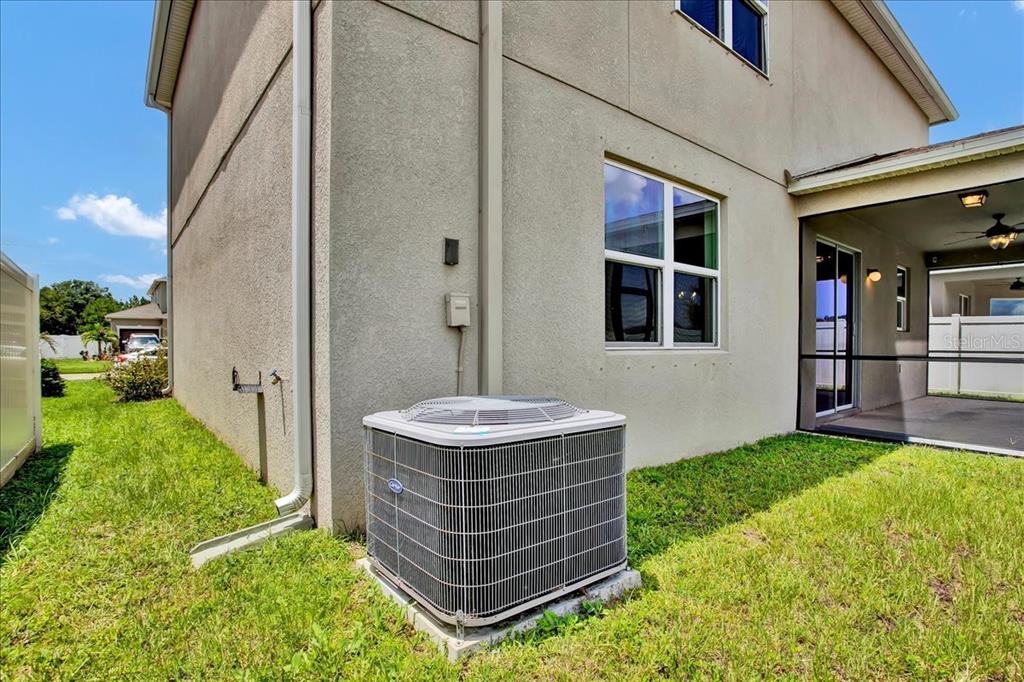 11544 Brighton Knoll Loop Riverview, FL 33579 - Photo 11 of 65 a front view of a house with a yard