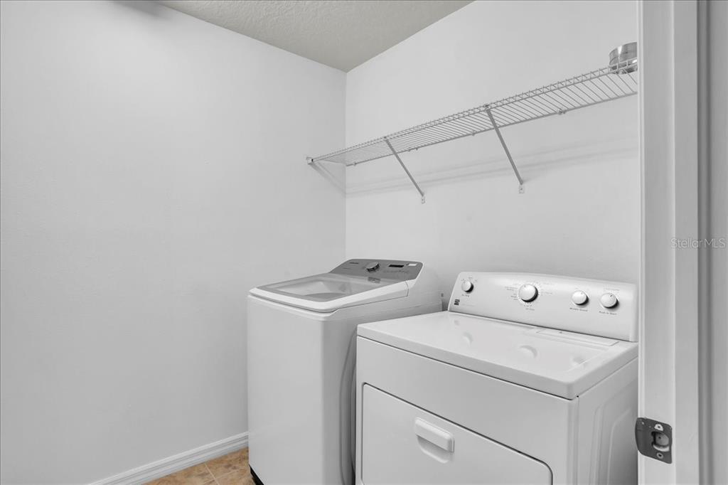 11544 Brighton Knoll Loop Riverview, FL 33579 - Photo 17 of 65 a utility room with dryer and washer