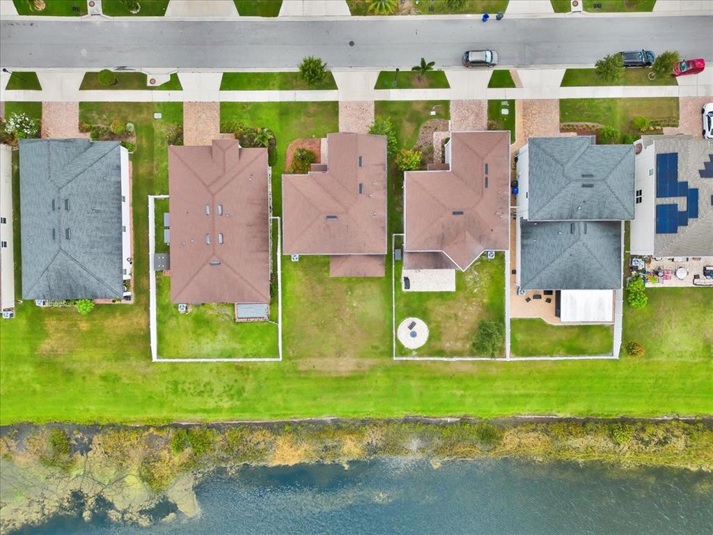11544 Brighton Knoll Loop Riverview, FL 33579 - Photo 30 of 65 an aerial view of a house with a yard and large trees