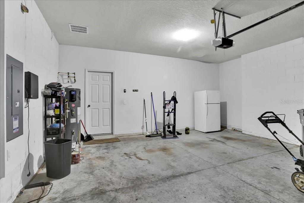11544 Brighton Knoll Loop Riverview, FL 33579 - Photo 53 of 65 a view of a room with gym equipment