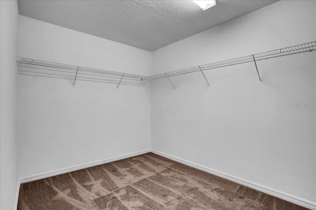 11544 Brighton Knoll Loop Riverview, FL 33579 - Photo 56 of 65 a view of a room with racks on the wall