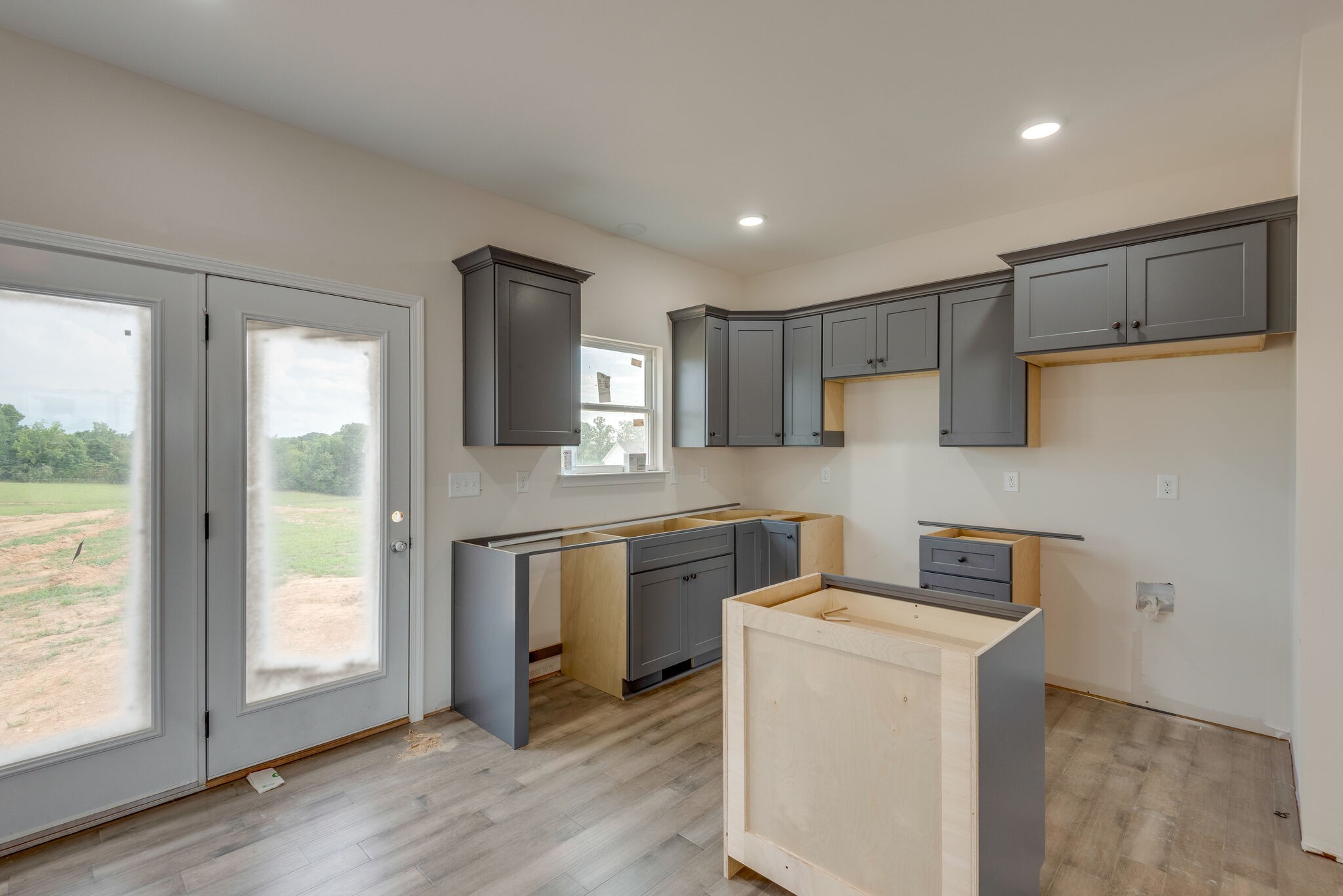 1202 Oak Grove Road Dickson, TN 37055 - Photo 12 of 28 a kitchen with a refrigerator sink and stove top oven